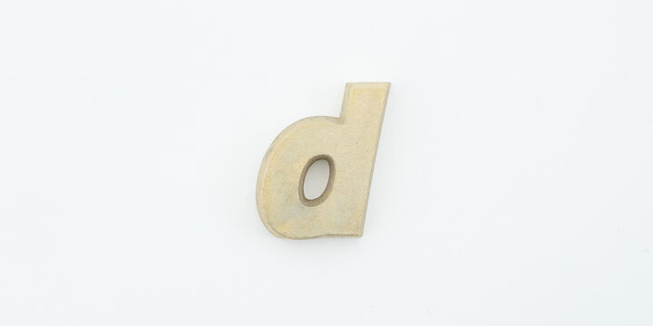 "d" Logo Paper Weight